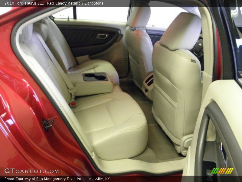 Red Candy Metallic / Light Stone 2010 Ford Taurus SEL