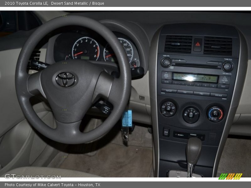 Desert Sand Metallic / Bisque 2010 Toyota Corolla LE