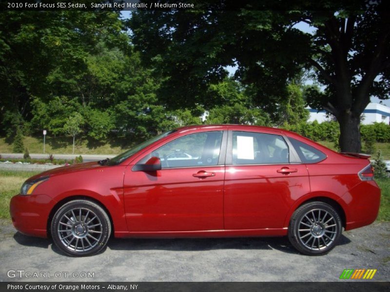 Sangria Red Metallic / Medium Stone 2010 Ford Focus SES Sedan