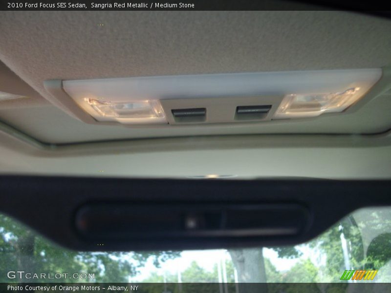 Sangria Red Metallic / Medium Stone 2010 Ford Focus SES Sedan