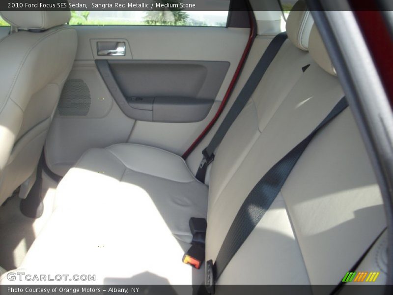 Sangria Red Metallic / Medium Stone 2010 Ford Focus SES Sedan