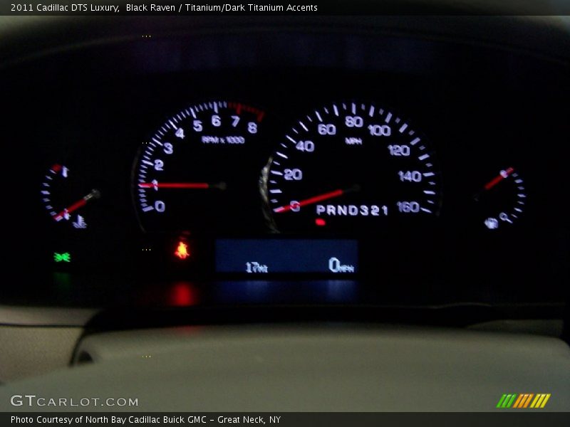 Black Raven / Titanium/Dark Titanium Accents 2011 Cadillac DTS Luxury
