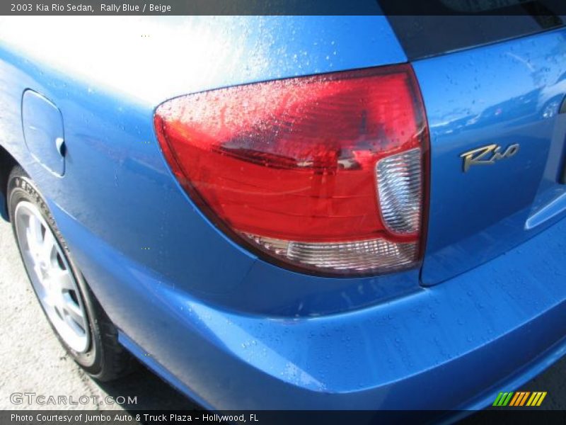 Rally Blue / Beige 2003 Kia Rio Sedan