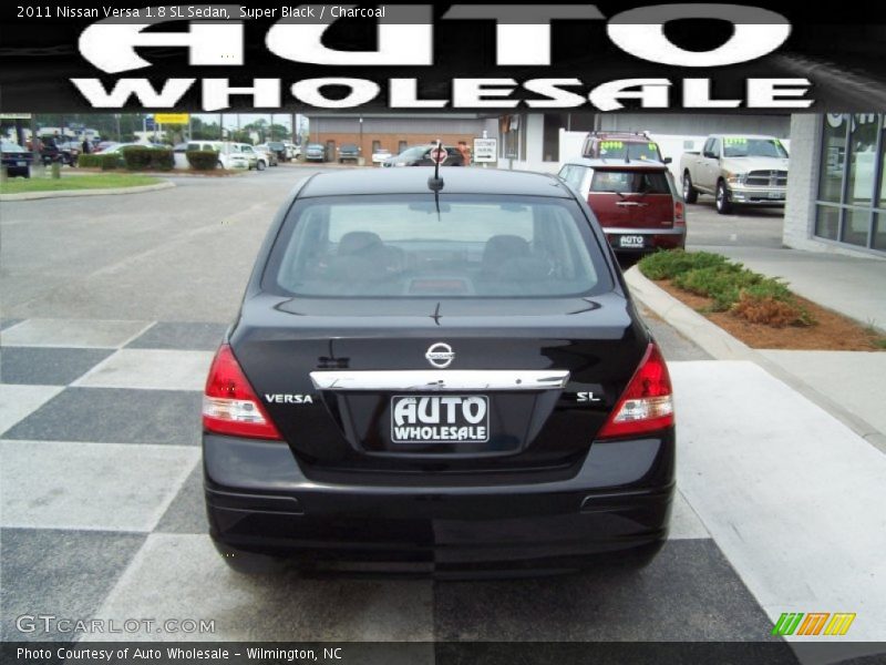 Super Black / Charcoal 2011 Nissan Versa 1.8 SL Sedan