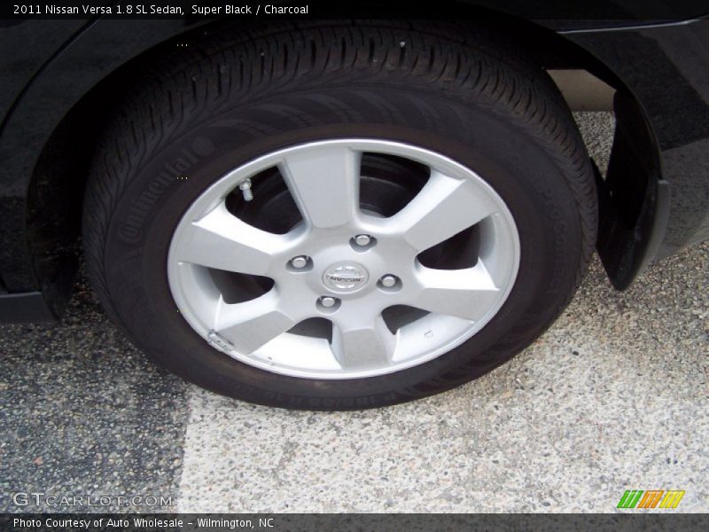 Super Black / Charcoal 2011 Nissan Versa 1.8 SL Sedan