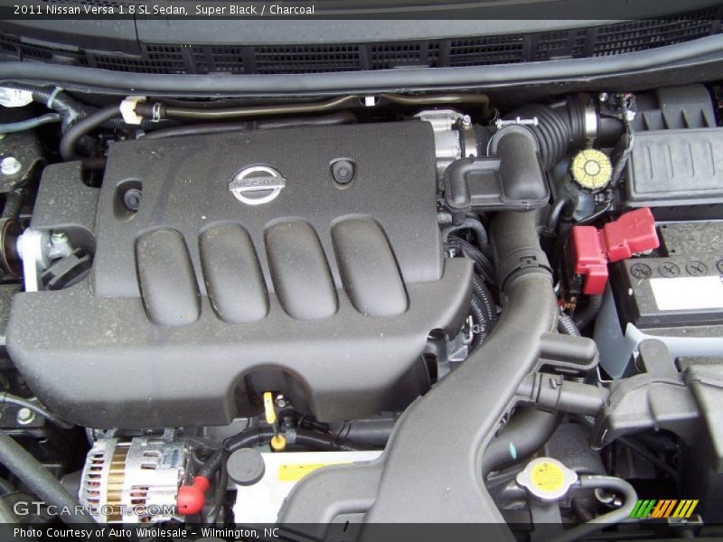 Super Black / Charcoal 2011 Nissan Versa 1.8 SL Sedan