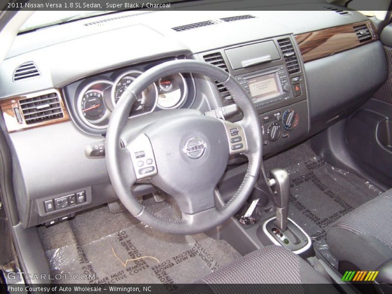 Super Black / Charcoal 2011 Nissan Versa 1.8 SL Sedan
