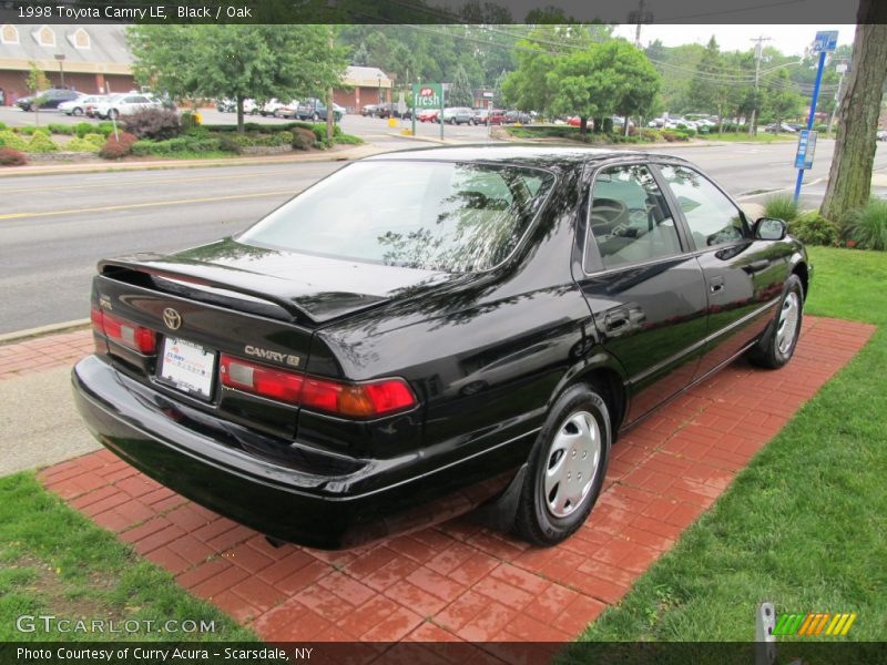 Black / Oak 1998 Toyota Camry LE