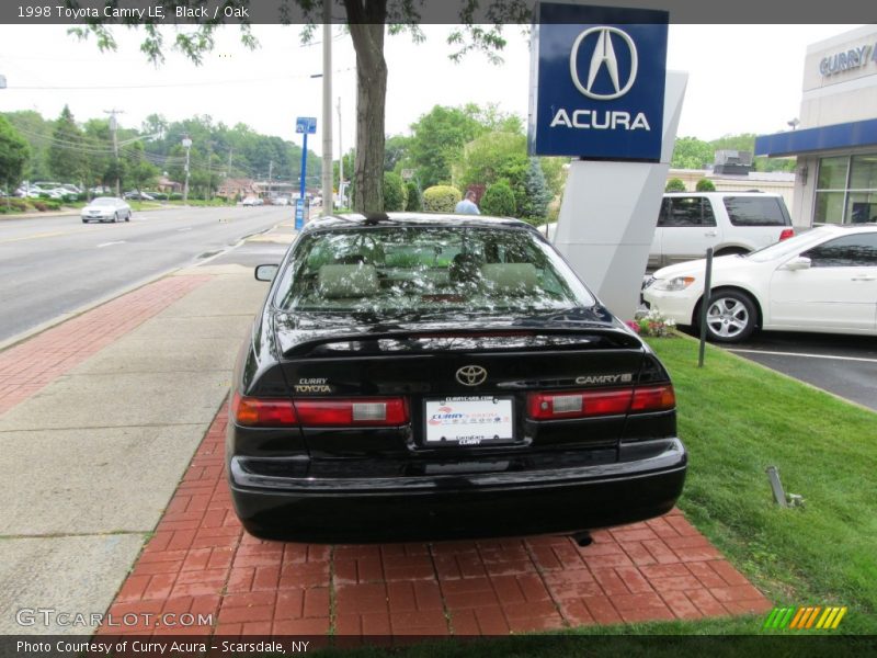 Black / Oak 1998 Toyota Camry LE