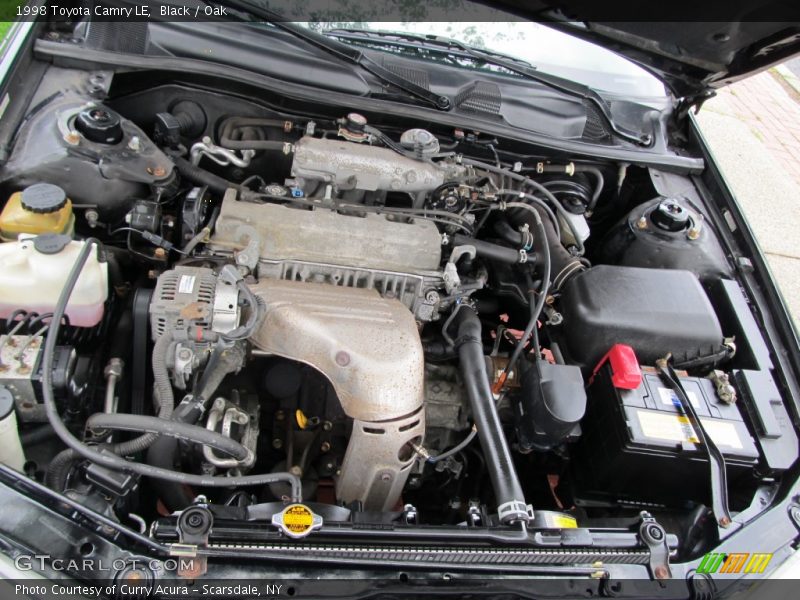 Black / Oak 1998 Toyota Camry LE