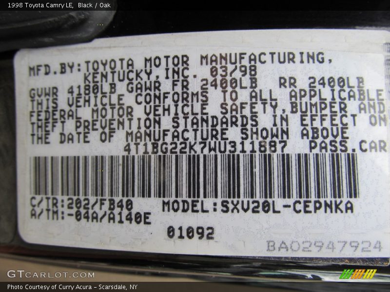 Black / Oak 1998 Toyota Camry LE