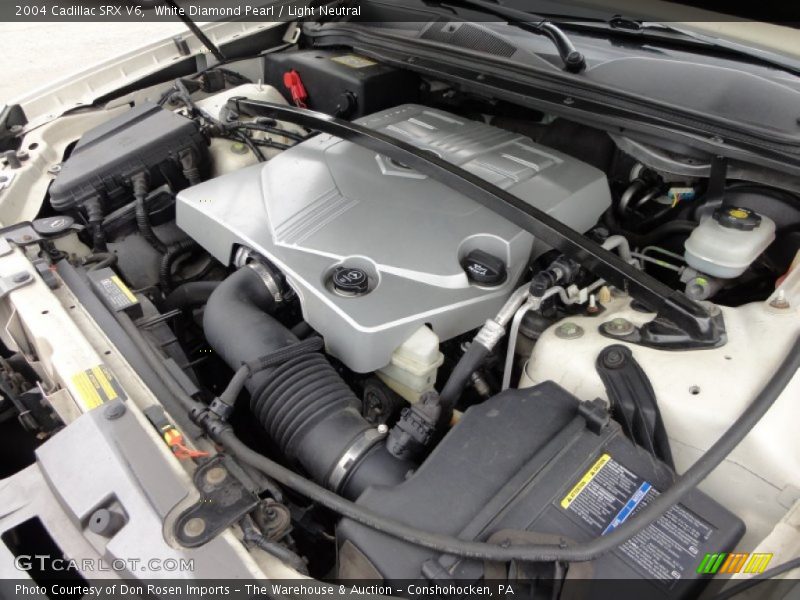 White Diamond Pearl / Light Neutral 2004 Cadillac SRX V6