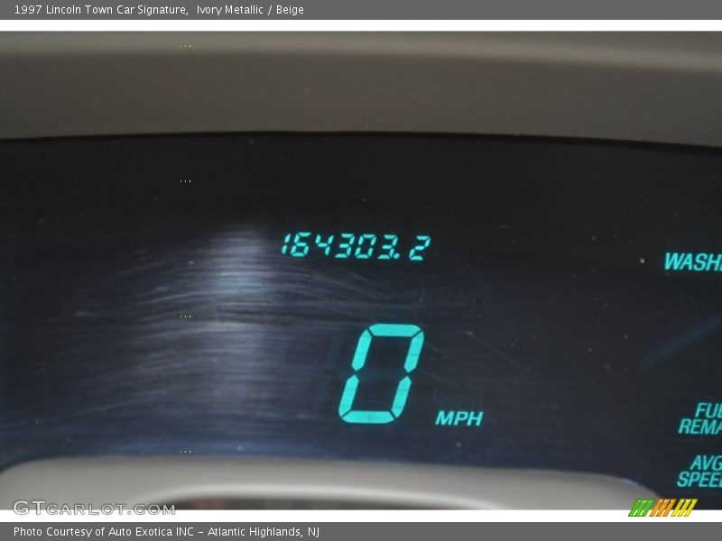 Ivory Metallic / Beige 1997 Lincoln Town Car Signature