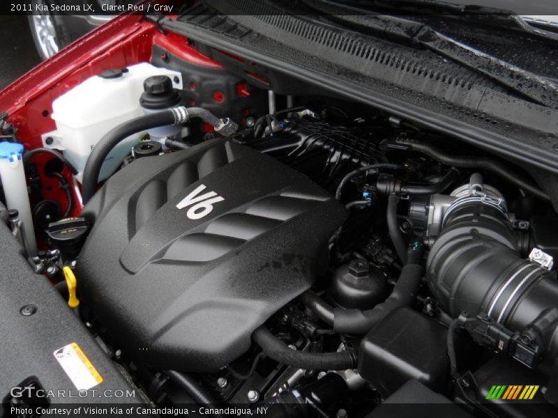 Claret Red / Gray 2011 Kia Sedona LX