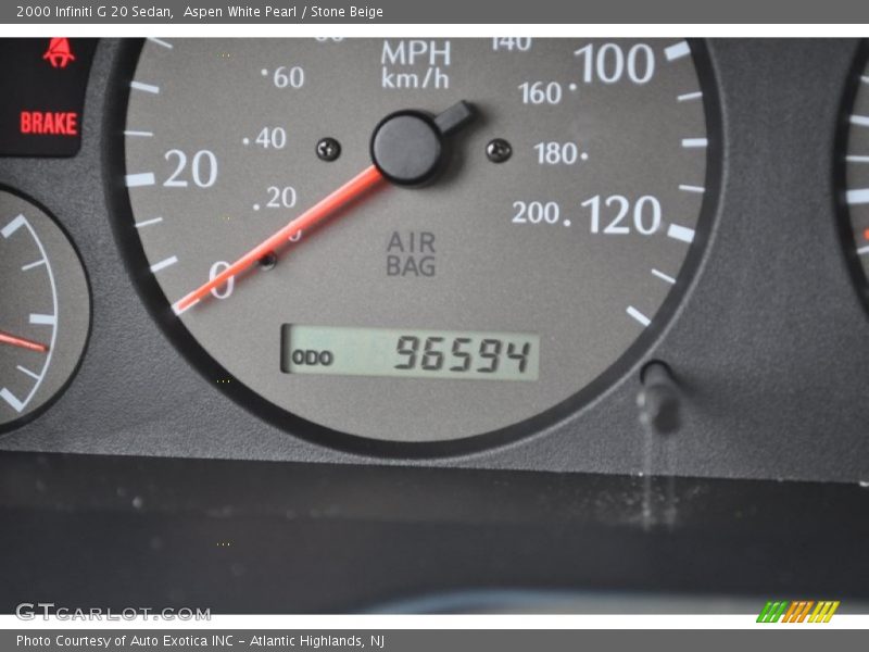 Aspen White Pearl / Stone Beige 2000 Infiniti G 20 Sedan