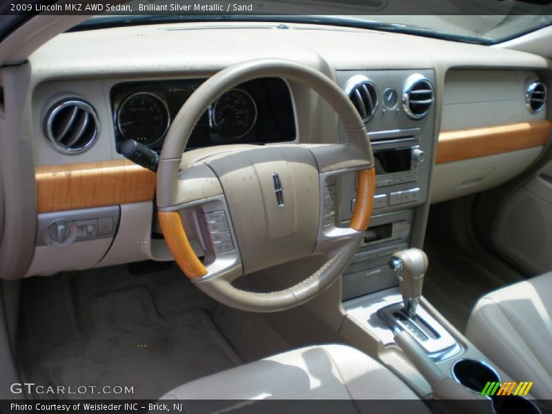 Brilliant Silver Metallic / Sand 2009 Lincoln MKZ AWD Sedan