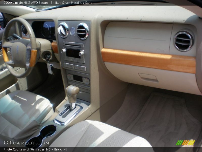 Brilliant Silver Metallic / Sand 2009 Lincoln MKZ AWD Sedan