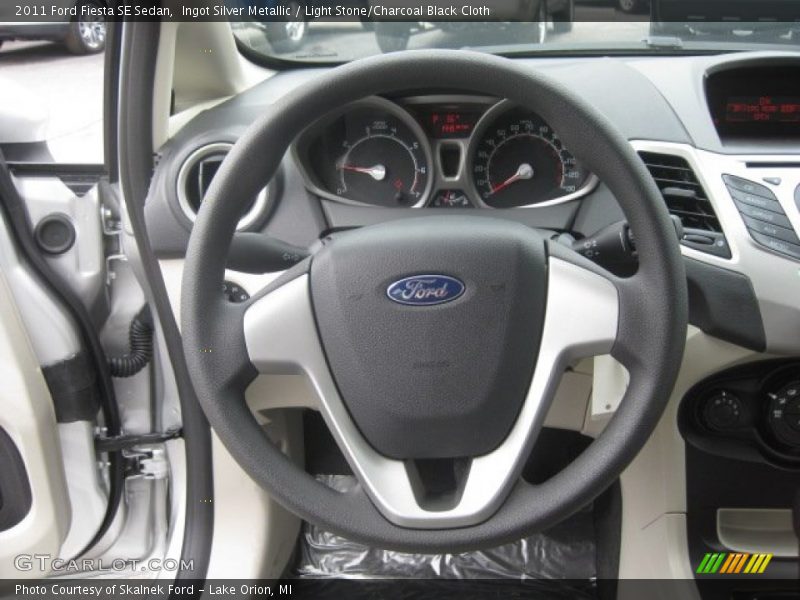 Ingot Silver Metallic / Light Stone/Charcoal Black Cloth 2011 Ford Fiesta SE Sedan