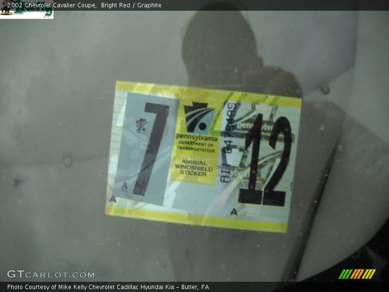 Bright Red / Graphite 2002 Chevrolet Cavalier Coupe