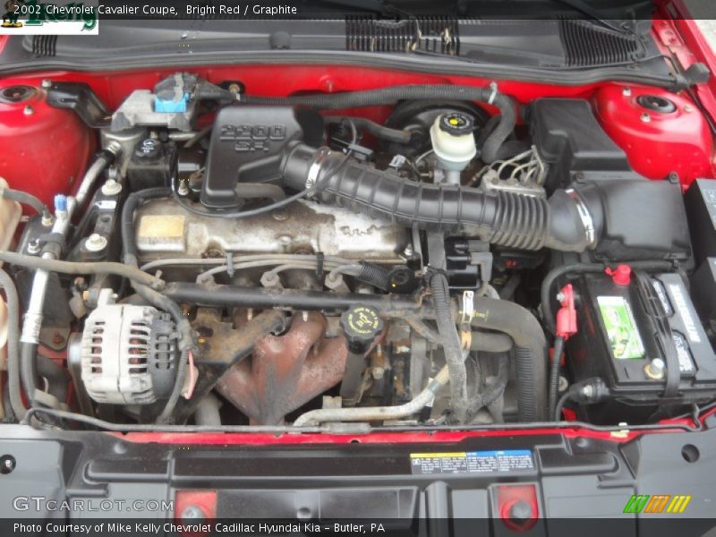 Bright Red / Graphite 2002 Chevrolet Cavalier Coupe