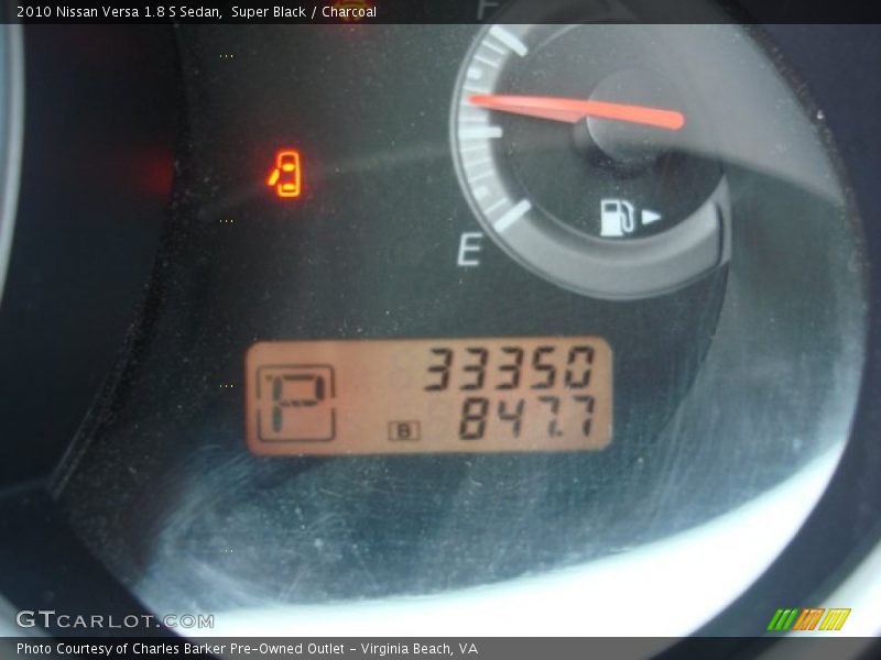 Super Black / Charcoal 2010 Nissan Versa 1.8 S Sedan