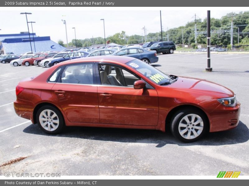 Paprika Red Pearl / Ivory 2009 Subaru Impreza 2.5i Sedan