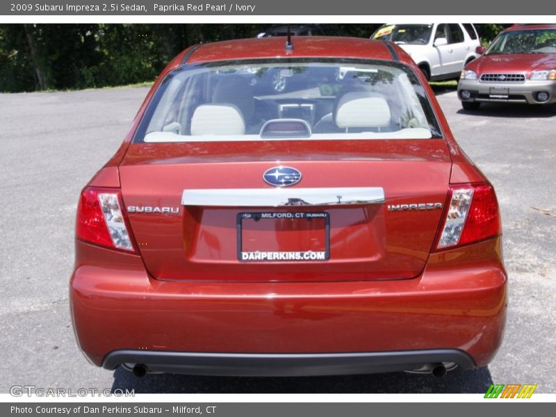 Paprika Red Pearl / Ivory 2009 Subaru Impreza 2.5i Sedan