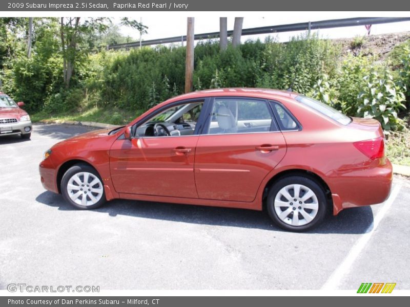 Paprika Red Pearl / Ivory 2009 Subaru Impreza 2.5i Sedan