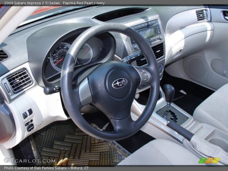 Paprika Red Pearl / Ivory 2009 Subaru Impreza 2.5i Sedan