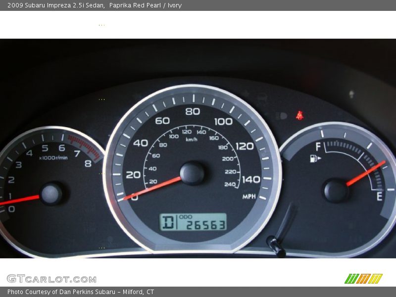 Paprika Red Pearl / Ivory 2009 Subaru Impreza 2.5i Sedan