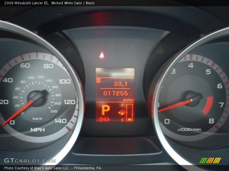 Wicked White Satin / Black 2009 Mitsubishi Lancer ES