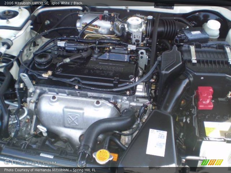 Igloo White / Black 2006 Mitsubishi Lancer SE
