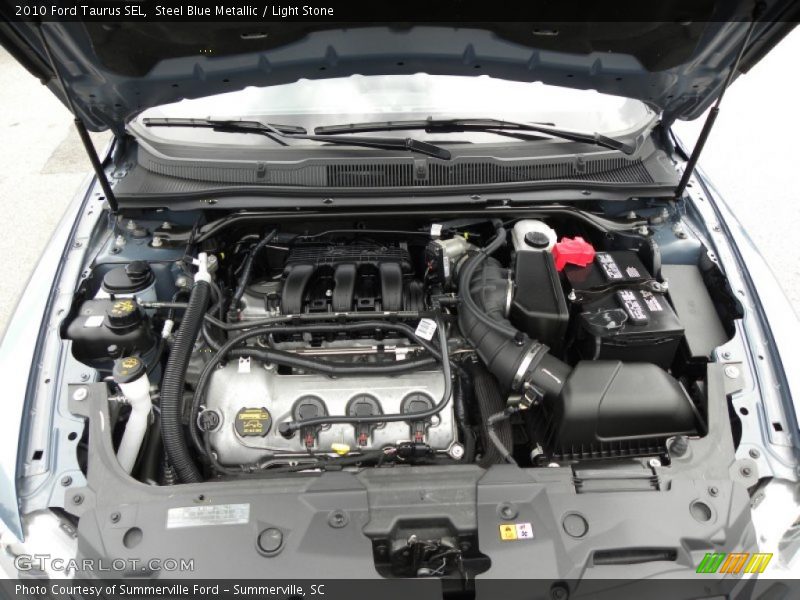 Steel Blue Metallic / Light Stone 2010 Ford Taurus SEL