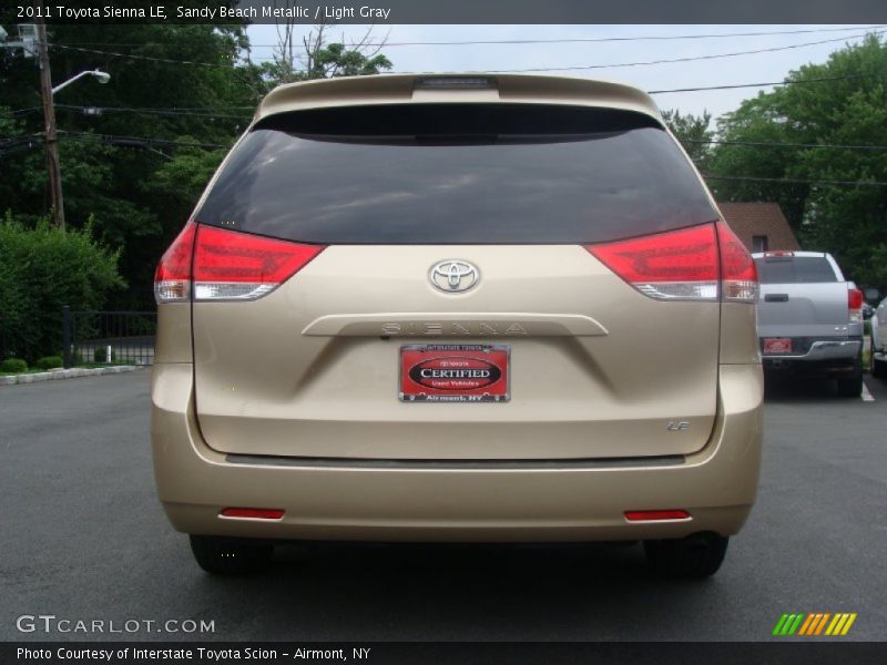 Sandy Beach Metallic / Light Gray 2011 Toyota Sienna LE