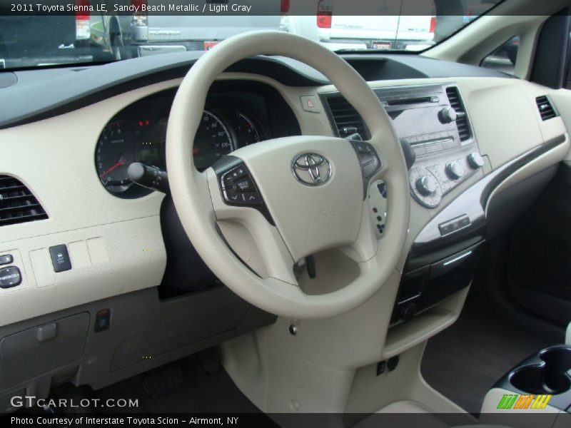 Sandy Beach Metallic / Light Gray 2011 Toyota Sienna LE