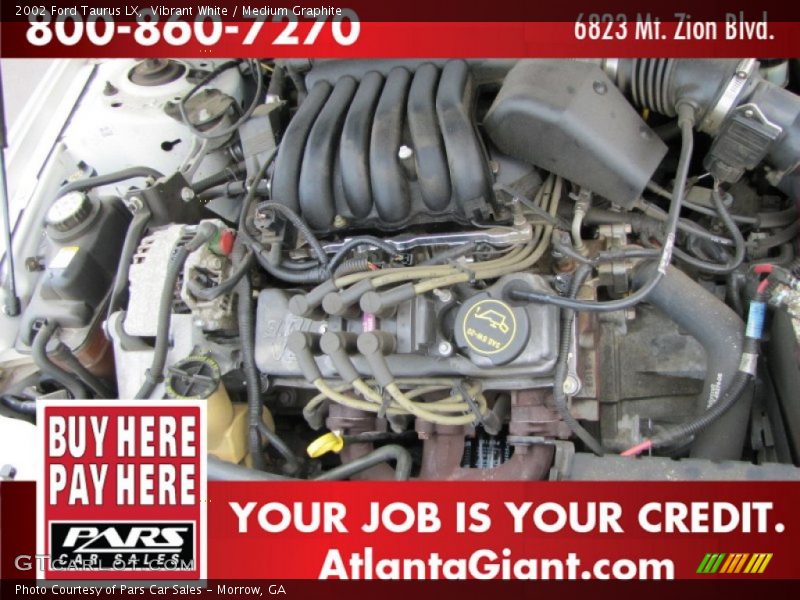 Vibrant White / Medium Graphite 2002 Ford Taurus LX