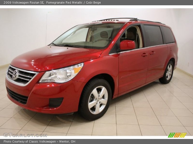 Pomegranate Red Metallic / Gobi Beige 2009 Volkswagen Routan SE