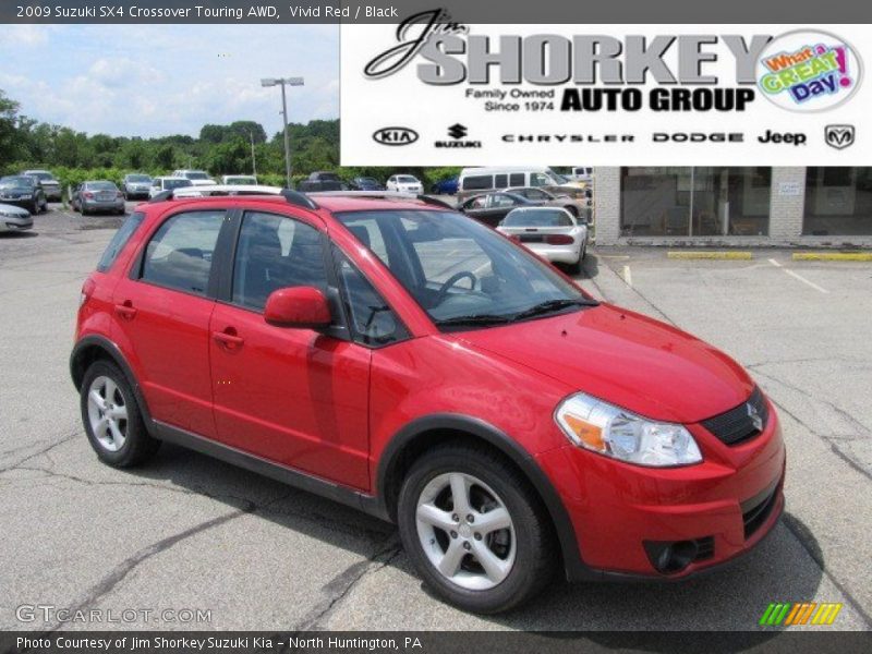 Vivid Red / Black 2009 Suzuki SX4 Crossover Touring AWD