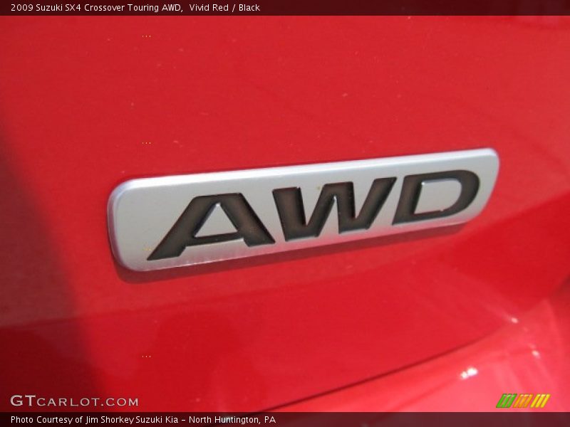 Vivid Red / Black 2009 Suzuki SX4 Crossover Touring AWD