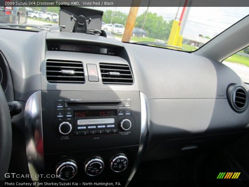 Vivid Red / Black 2009 Suzuki SX4 Crossover Touring AWD