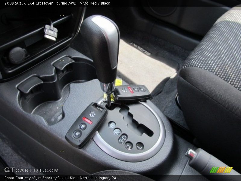 Vivid Red / Black 2009 Suzuki SX4 Crossover Touring AWD