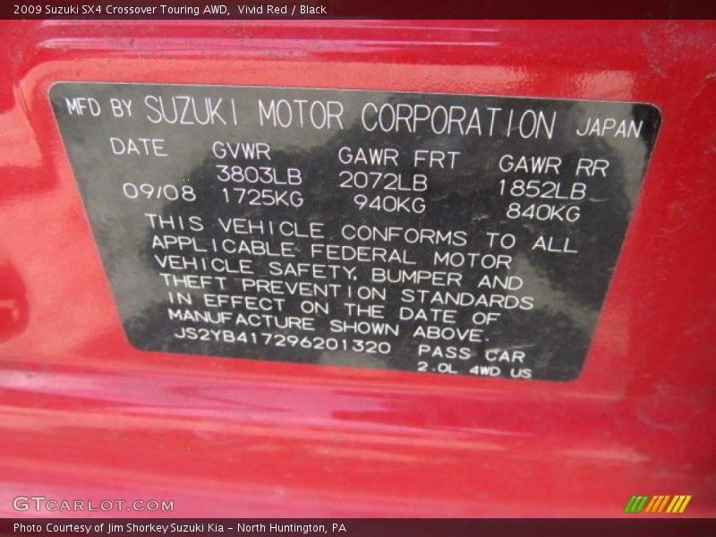 Vivid Red / Black 2009 Suzuki SX4 Crossover Touring AWD