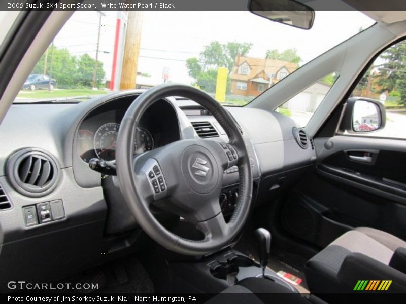 White Water Pearl / Black 2009 Suzuki SX4 Sport Sedan