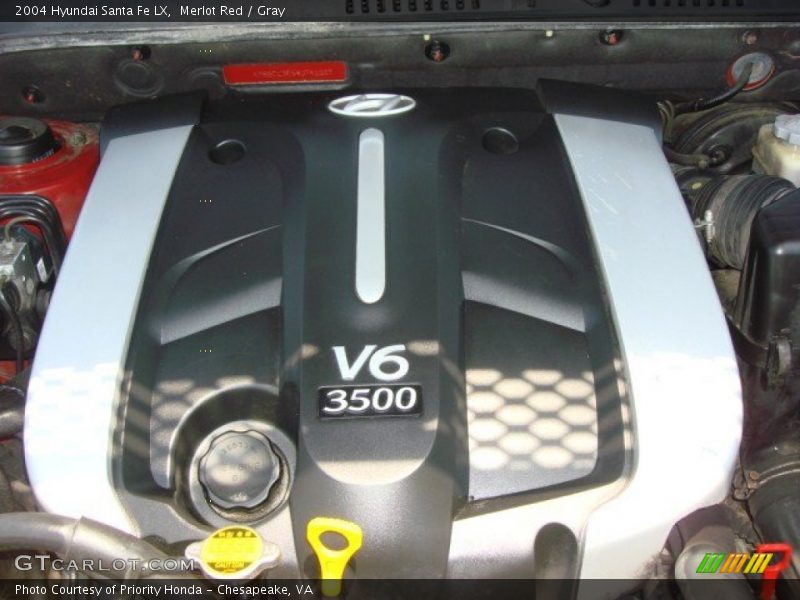 Merlot Red / Gray 2004 Hyundai Santa Fe LX