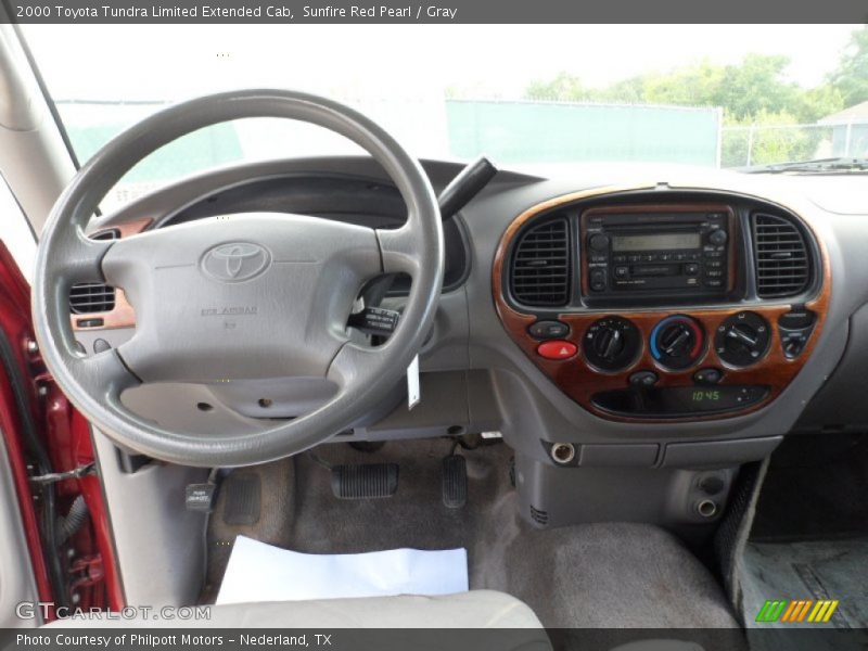 Sunfire Red Pearl / Gray 2000 Toyota Tundra Limited Extended Cab