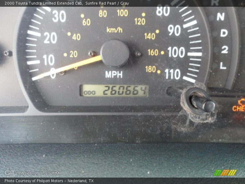 Sunfire Red Pearl / Gray 2000 Toyota Tundra Limited Extended Cab
