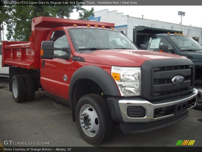 Front 3/4 View of 2011 F550 Super Duty XL Regular Cab 4x4 Dump Truck