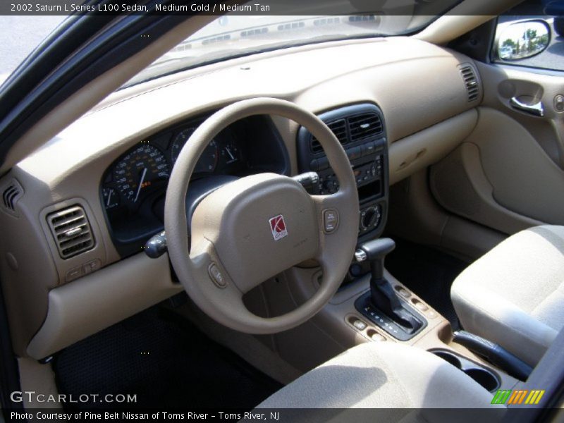  2002 L Series L100 Sedan Medium Tan Interior