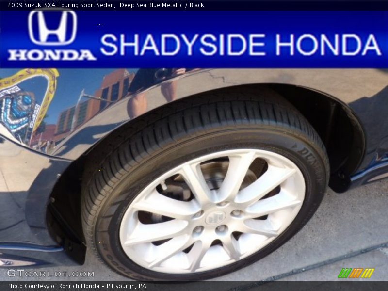 Deep Sea Blue Metallic / Black 2009 Suzuki SX4 Touring Sport Sedan