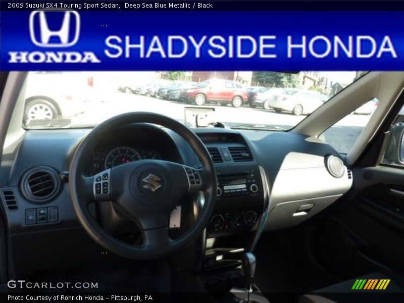 Deep Sea Blue Metallic / Black 2009 Suzuki SX4 Touring Sport Sedan